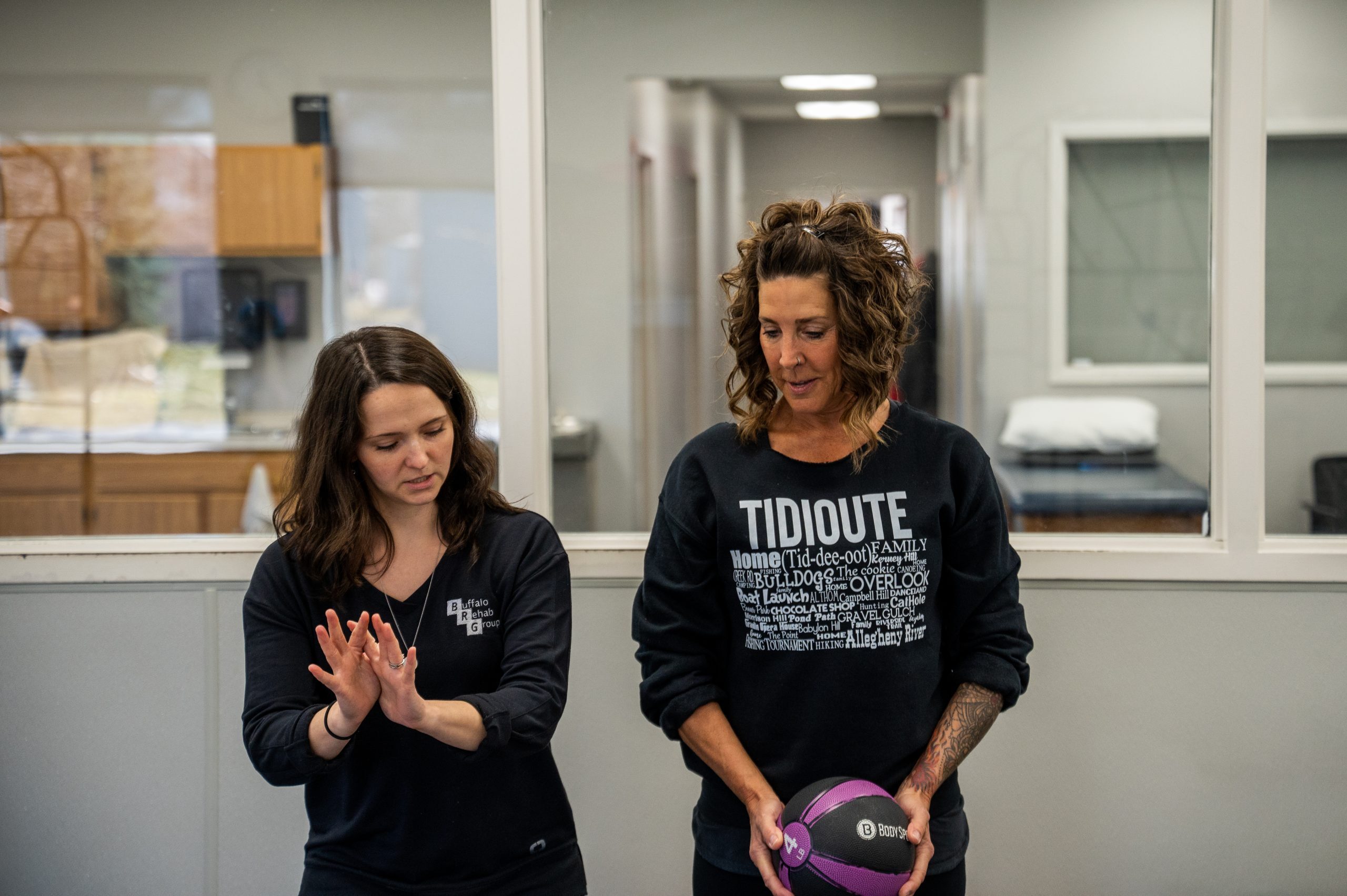 Jake Woodrich, PT DPT CSCS, Laura Rowand, PTA, and Serena Jung, PTA treating their patients at their clinics.