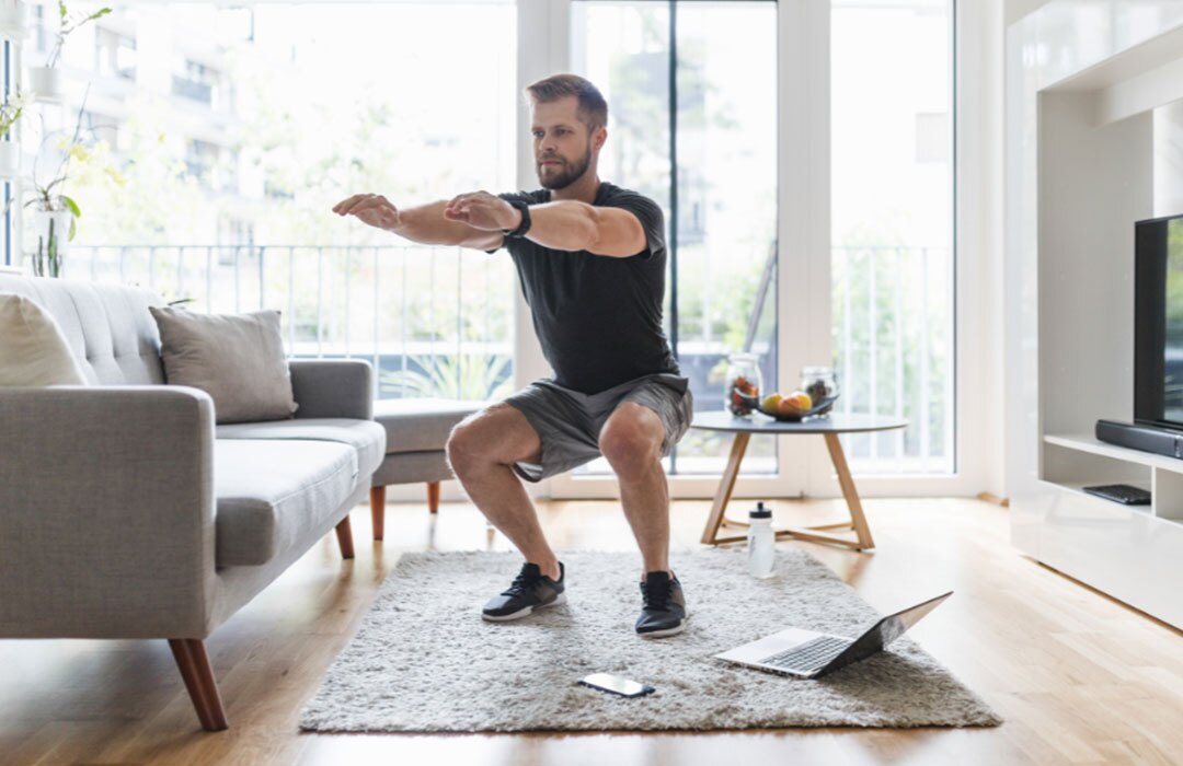 A certified occupational therapy assistant smiles as she converses with her patient.