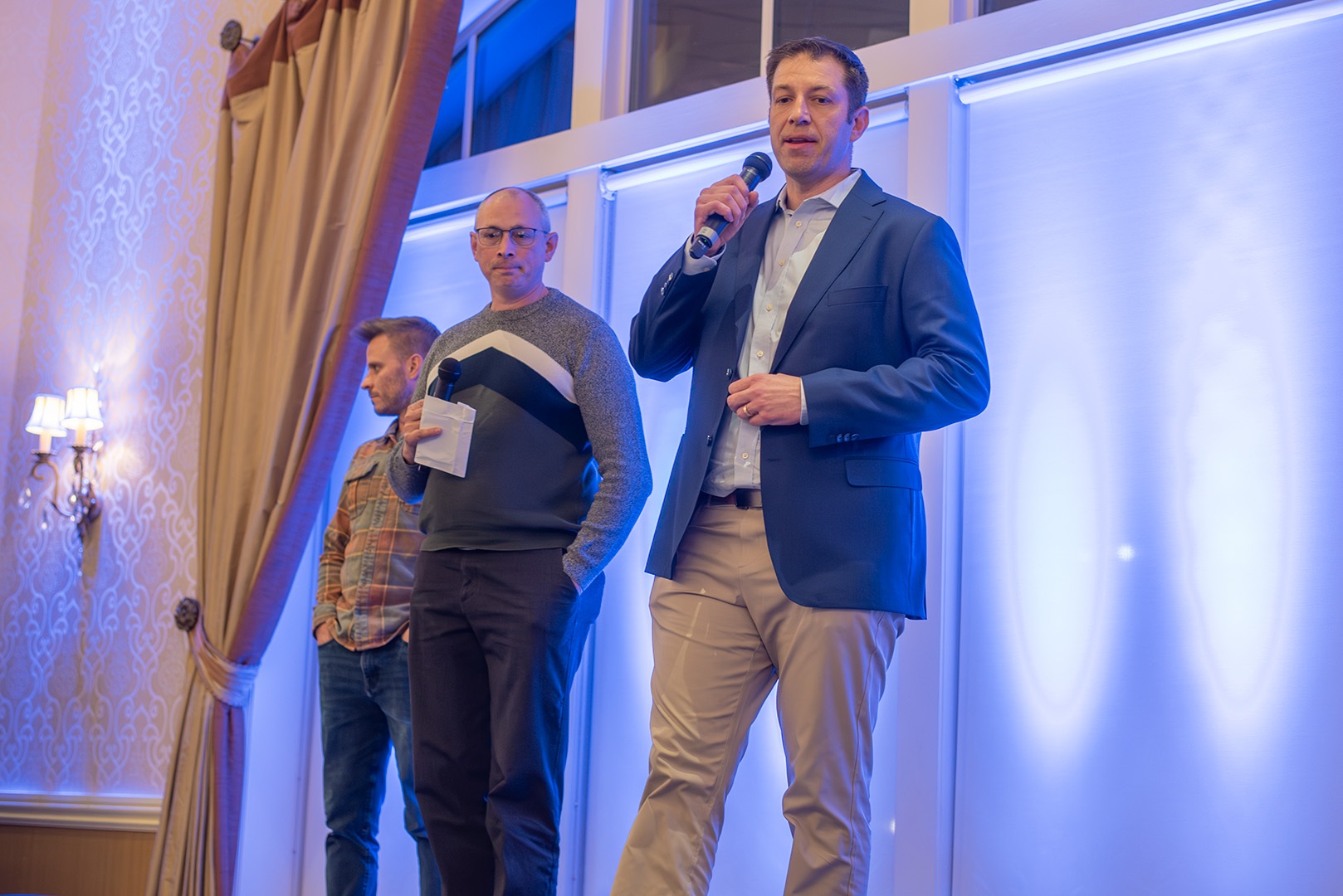 Image of Eric Herman, PT FAFS, Chief Clinical Officer and Ray Hammel, PT DPT MS, Chief Financial Officer speaking at the BRG 2025 Annual Meeting.